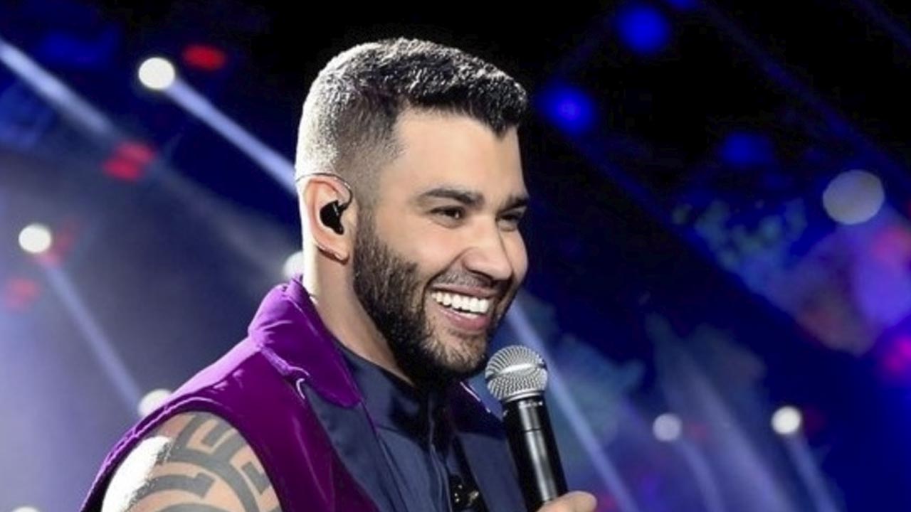 Gusttavo Lima mandou segurança tirar mulher que jogou água nele de show (Instagram)