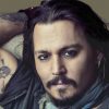 Johnny Depp doa parte do dinheiro recebido em processo para instituição do amigo falecido Marlon Brando